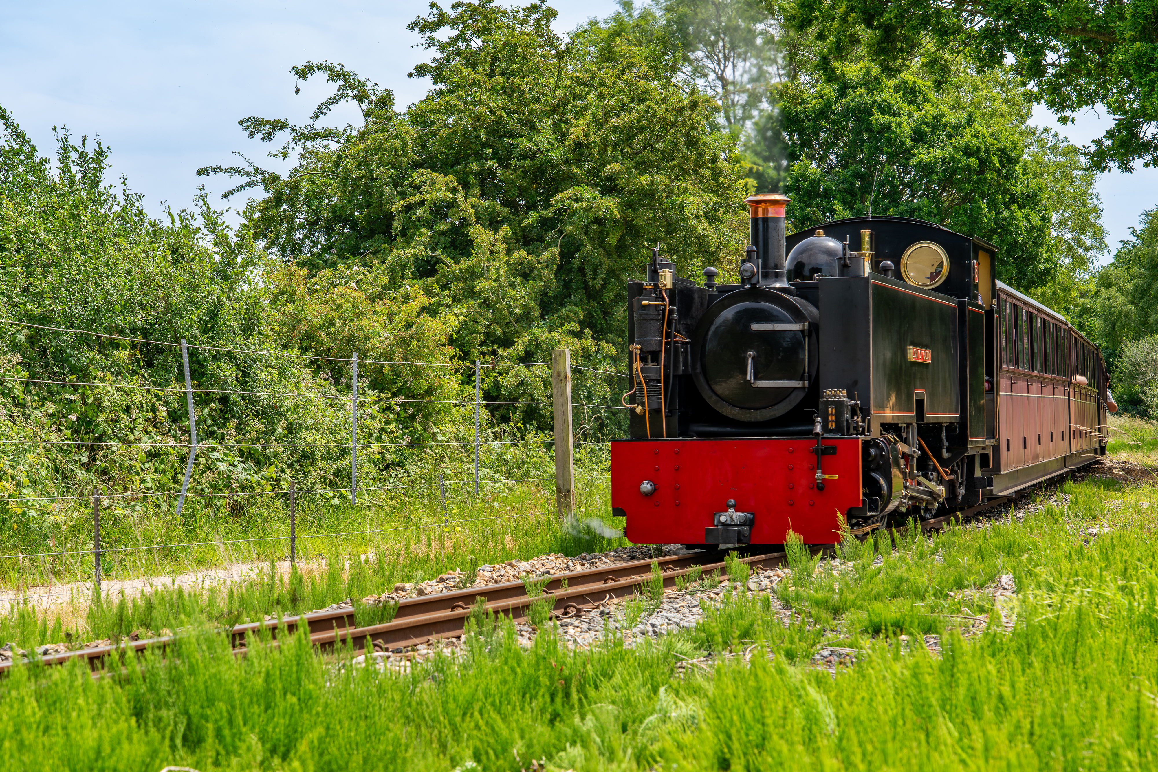 No. 8 John of Gaunt locomotive travelling through the countryside